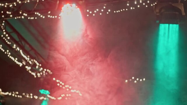 Bright Colors And Haze Evoke Lively Festival Scenes, Lighting And Smoke Combine To Produce Energetic Concert Atmosphere, Colored Lighting And Fog Differentiate Lively Atmosphere Of Music Festival