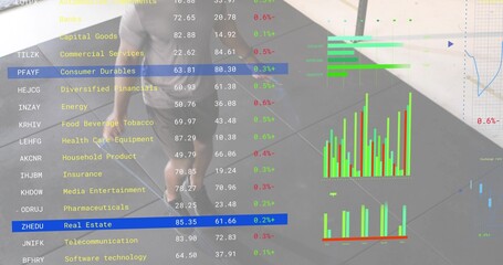 Walking man wearing light t-shirt and shorts across tiled lobby, with finance tickers and blue rows