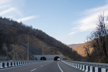 tunnel ahead of the road through the mountain