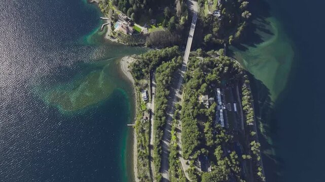 Scenic aerial view of the narrow bridge connecting Lake Nahuel Huapi and Lake Correntoso via the Correntoso River bridge in Villa La Angostura, Patagonia
