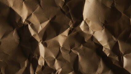 Sepia-toned close-up photo of a crumpled piece of paper, emphasizing its dramatic folds, creases, and textured shadows.