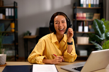Asian woman remote working connecting video call laughing