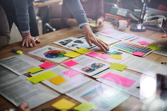 Businesspeople brainstorming and planning project