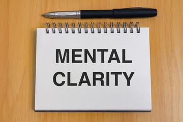 Mental Wellness and Mindfulness Concept with Mental Clarity text on Notebook