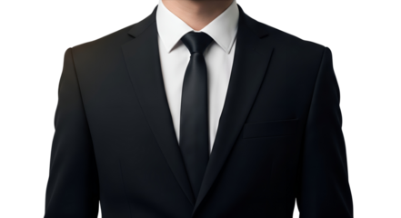 A man in a black suit and tie stands against a transparent background