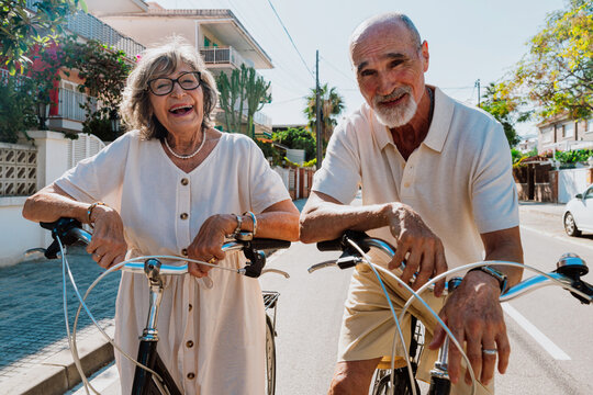 Senior couple taking selfie while enjoying active summer vacation