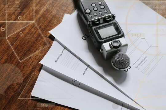 Portable sound recorder on a wooden table