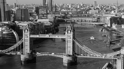 Tower Bridge and River Thames with historic and modern architecture under clear sky