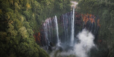 Majestic waterfall amidst lush greenery