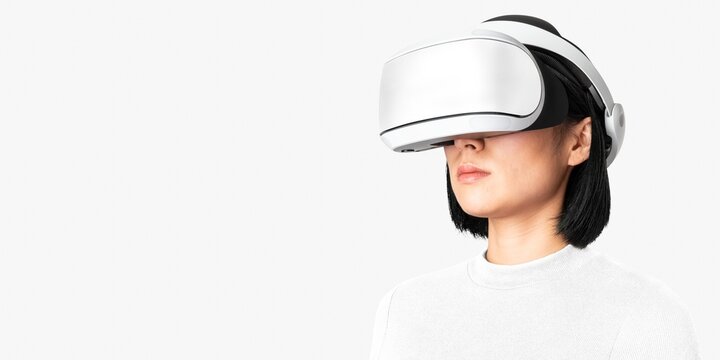 Woman wearing virtual reality headset - Powered by Adobe