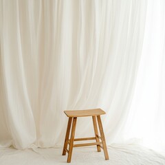 Natural wooden stool in minimalist studio setting