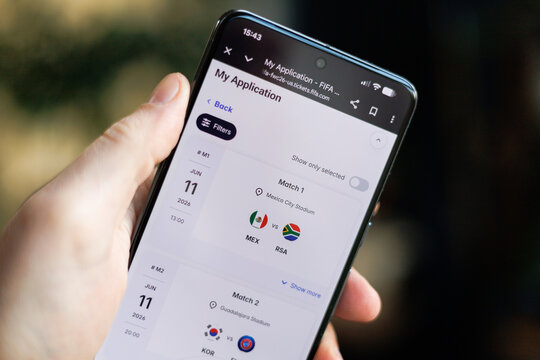 My application page on FIFA World Cup 2026 ticketing on phone in hand in lifestyle background