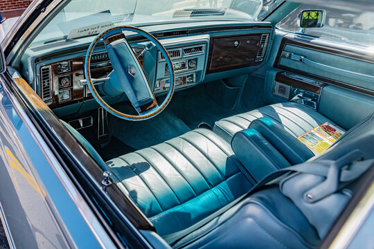 The leather blue interior of the iconic American luxury car, the 1978 Cadillac Coupe DeVille.