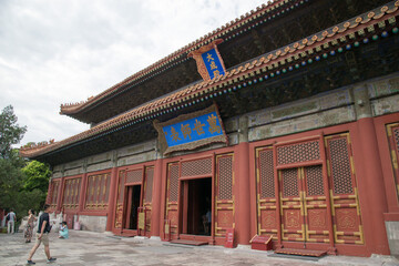 Fototapeta premium Yonghe Temple Beijing - Traditional Chinese Architecture with Red Doors