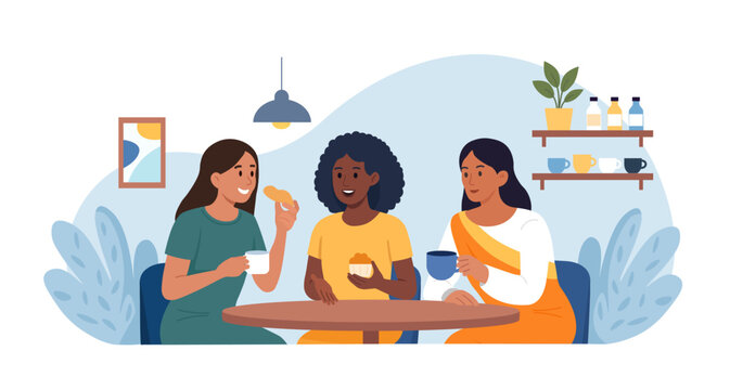 Cheerful and diverse group of friends are gathered around table at cafe, enjoying coffee and conversation. People are drinking tea together. Smiling women gossiping spending time at cafeteria