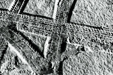 Tire tracks in the snow that could be a background