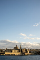 Breathtaking view of Valletta skyline from Sliema at sunset