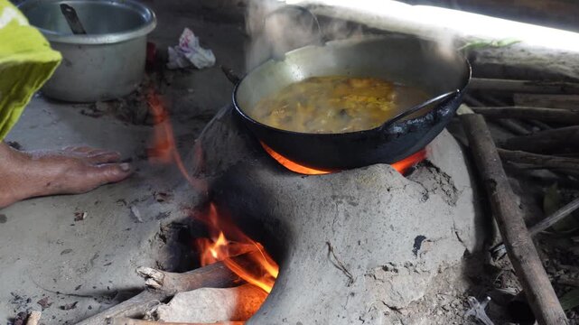 Food cooking on traditional rural wooden stove
