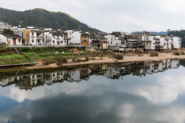 Obraz premium Wangkou Village Wuyuan - Traditional Houses Reflected in River, China