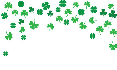 Falling green shamrocks and four-leaf clovers isolated on white background. St. Patrick's Day pattern for Irish holiday banners, greeting cards, luck concepts, and spring nature designs.