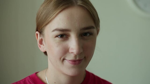 closeup of woman savoring crunchy snack, reaction shots of woman munching and smiling casually, casual culinary moment capturing woman tasting and enjoying crunchy snack at kitchen counter