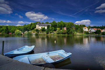 Peaceful Harbor With Picturesque Vistas, Silent Waterfront Showing Faraway Castle And Village