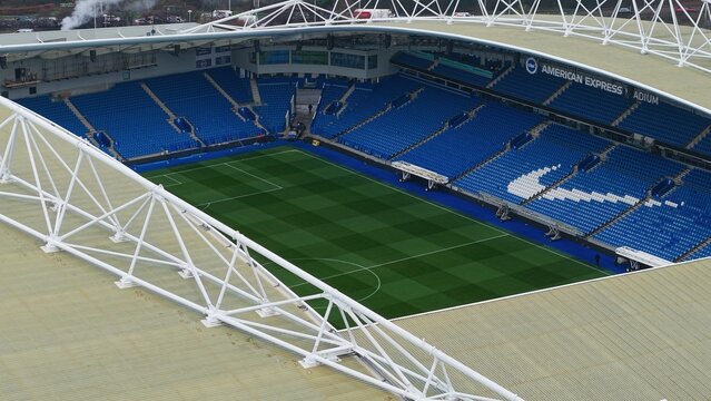 BRIGHTON, UK - JANUARY 08, 2026 - American Express Stadium in Falmer showcasing empty blue seats and green football pitch