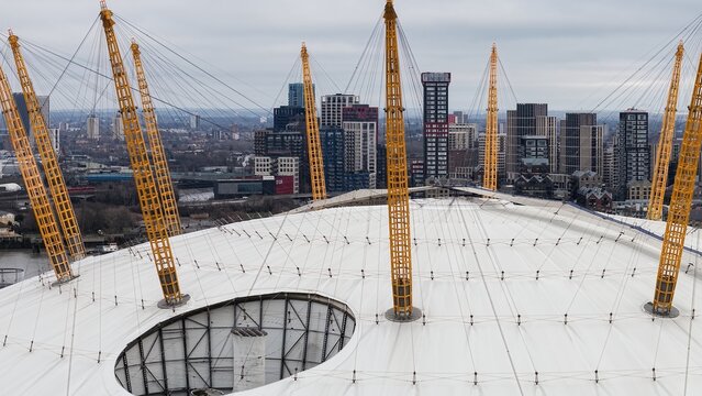 LONDON, UK - JANUARY 07, 2026 - O2 Arena dome structure with London cityscape and modern architecture in background