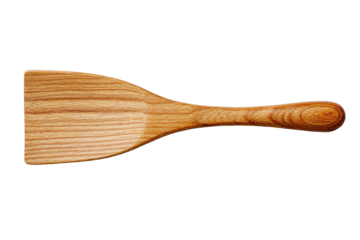 Wooden spatula turner with flat paddle blade and smooth handle, natural wood grain texture with clean edges and simple kitchen utensil form, isolated on transparent background.
