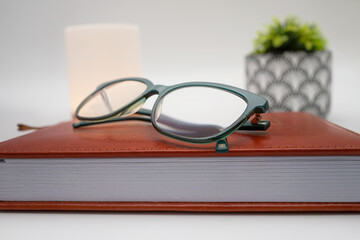 Appointment Planner with Glasses and Laptop for Modern Work Organization