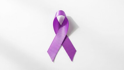 Single purple awareness ribbon on white background