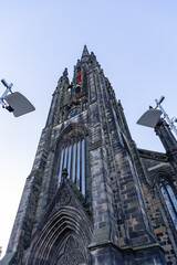 Gothic Church Tower with Clock  in Edinburgh, Scotland.