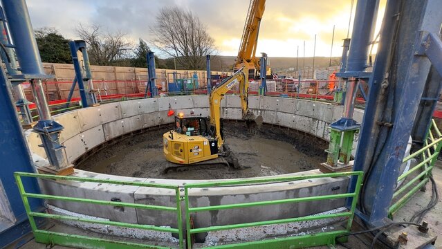 Construction Excavation Site with Excavator and Machinery in Ilkley, UK.