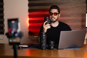 Blogger recording video with phone