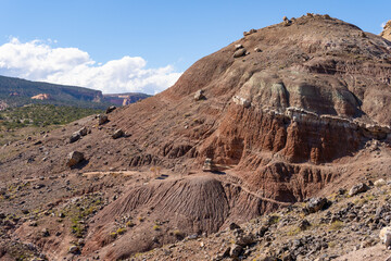 Dinosaur Hill in Fruita, Colorado, a premier fossil site where the rear two-thirds of an Apatosaurus was excavated in 1901. The mile-long loop offers interpretive signs and panoramic views of the Gran © Adam