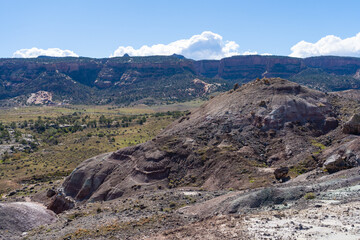 Dinosaur Hill in Fruita, Colorado, a premier fossil site where the rear two-thirds of an Apatosaurus was excavated in 1901. The mile-long loop offers interpretive signs and panoramic views of the Gran © Adam