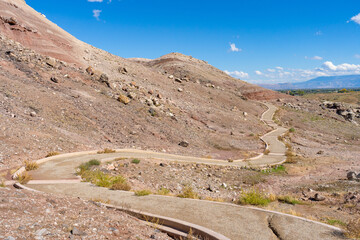 Dinosaur Hill in Fruita, Colorado, a premier fossil site where the rear two-thirds of an Apatosaurus was excavated in 1901. The mile-long loop offers interpretive signs and panoramic views of the Gran © Adam