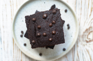Homemade Chocolate Brownies on a Wooden Cutting Board