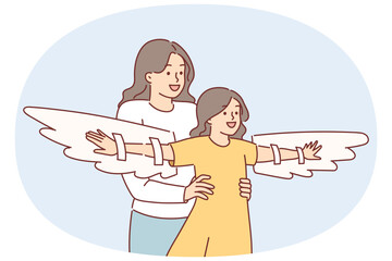 Mother plays with daughter using imaginary wings to motivate child to achieve goals