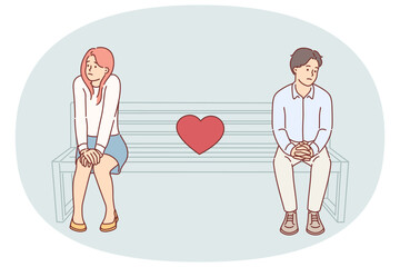 Shy couple on first date, sitting on park bench and feeling awkward due to lack of common interests