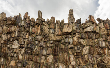 The wall of the Historic Petrified Wood Building in Lamar, Colorado, built in 1932 by lumber dealer William T. Brown, using petrified wood logs