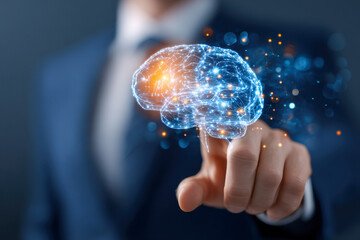 Businessman in a suit activating a glowing digital brain interface symbolizing intelligence, innovation, and advanced technology concept in a dark environment