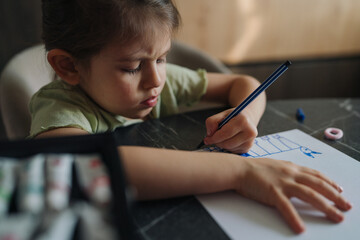 focused sketcher caucasian girl closeup concentration