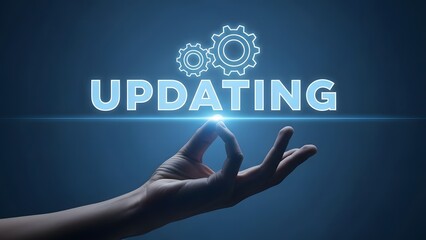 A hand reaching for an updating process with glowing gears and light