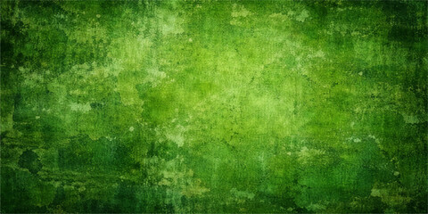 Obraz premium An abstract green grunge background with a vintage textured wall pattern featuring aged paper art and dark grassy nature tones on a weathered surface