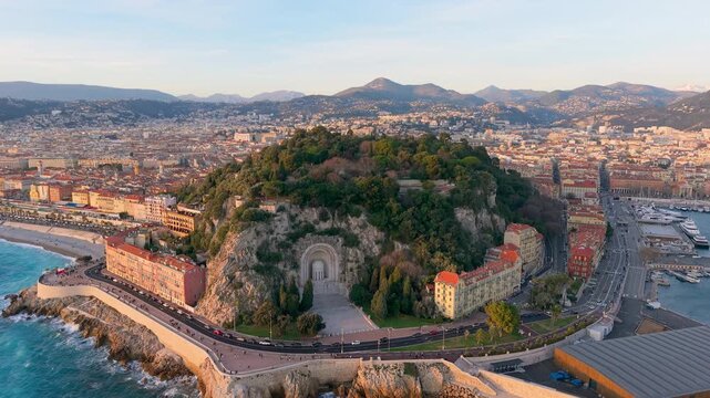 Sunset Coastal Panorama, Drone Captures Seaside Cityscape, Golden Hour View Of Port And Hills. Nice, France