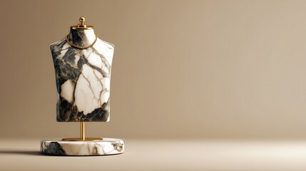 Luxury marble bust display with golden chain necklace on stand.