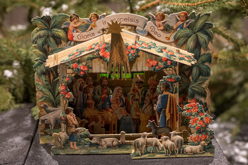 A paper nativity scene displayed in detail.
