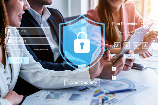 A group of business professionals engaged in a meeting focused on cyber security practices, featuring a digital lock and data protection symbols. Gantry - Powered by Adobe