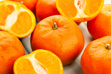 sliced tangerine on wood background